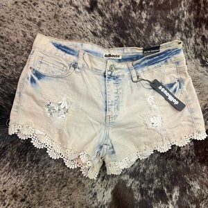 Acid wash denim lace shorts